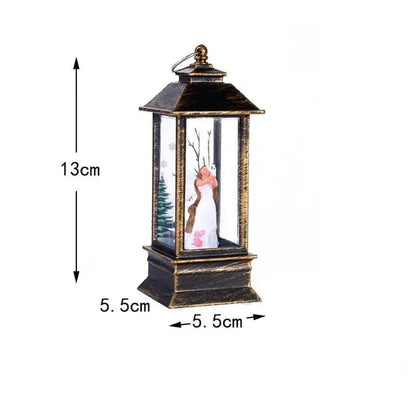 A decorative lantern-shaped ornament with a winter fairy figurine inside, shown with dimension arrows and labels indicating 13cm height and 5.5cm width on a white background.