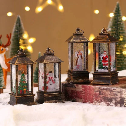 Set of four decorative lanterns with Christmas scenes on a snowy surface.