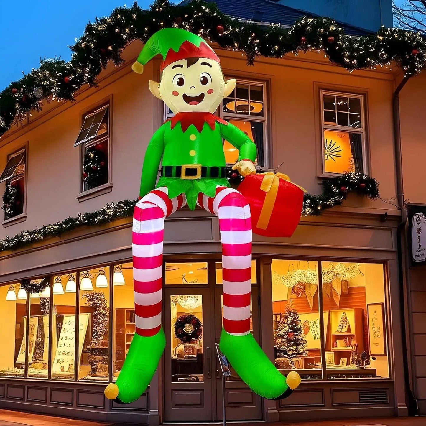 TK-H Merchandise 8ft inflatable sitting elf decoration with LED lights and a gift box for outdoor holiday home decor